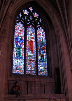 Our tourguide perched beneath Louis Pasteur