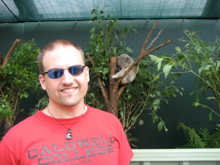 Bill poses with a koala