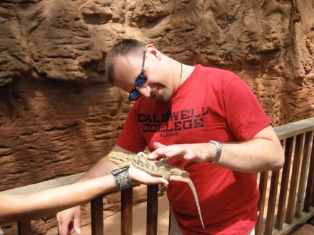 Petting the bearded dragon