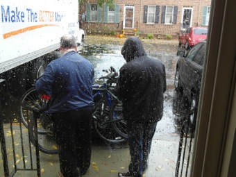 Garret and his father securing the bikes