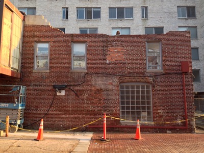 March 21. Starting to tear down the walls of the back building.