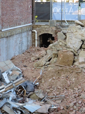 Looks like a passageway from the old Caribou Coffee building down under the sidewalk toward the street?