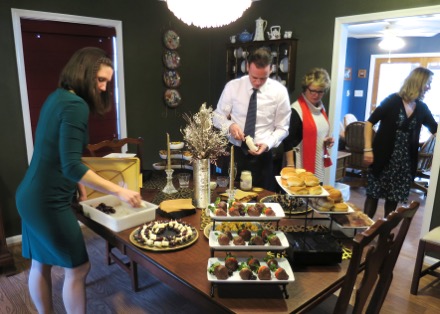 Katlin and Garrett prepare the table