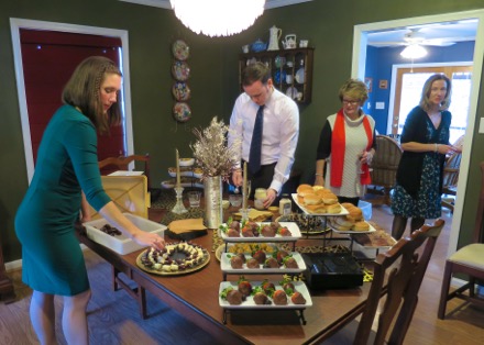 Katlin and Garrett prepare the table