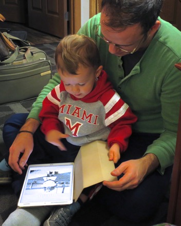 Remy reviewing a photo of little Grandma