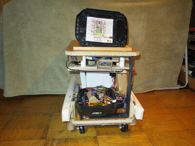 The bottom of the battery box holds the circuit diagram for ItsyBitsy M4.