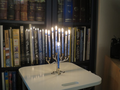 Menorah on the last night of Hanukkah, going...