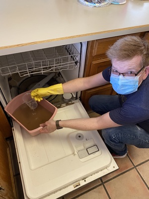 Emptying the gross dishwasher