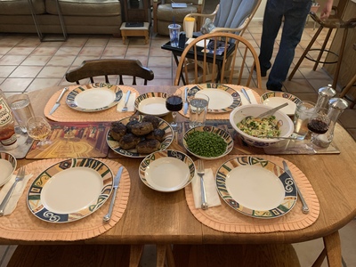 Hamburger, peas and salad for Christmas Eve dinner