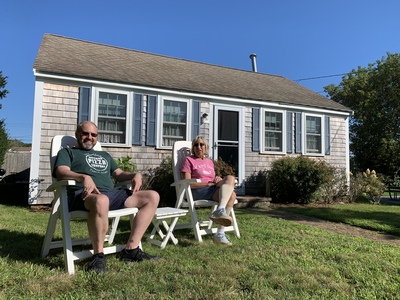 Bill and Karen pose out front